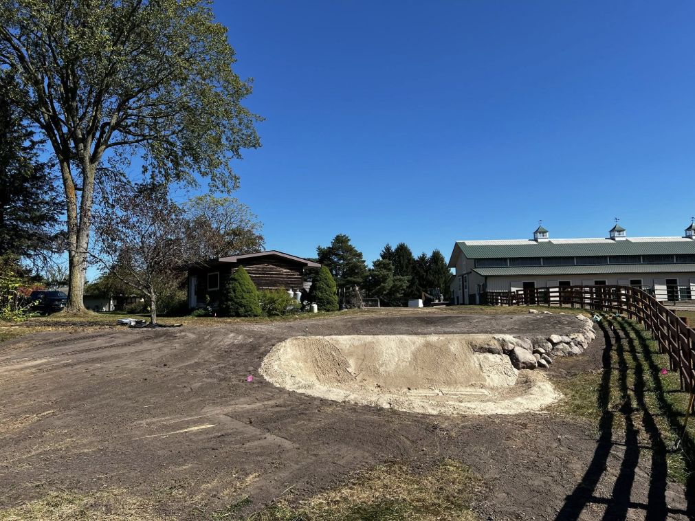 Three-tier undulating green in progress on a horse farm in Metamora Michigan