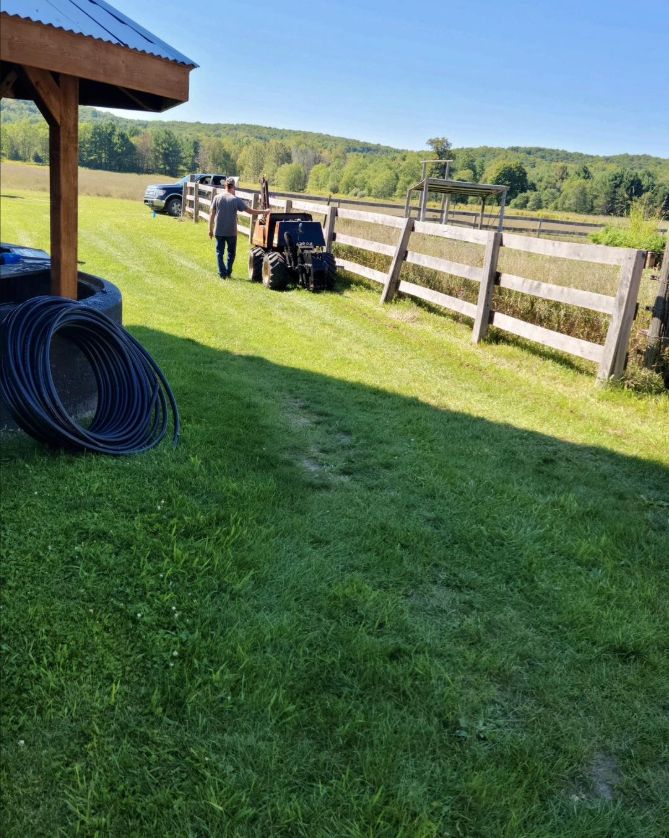 Irrigation system installation with pipe pulling equipment