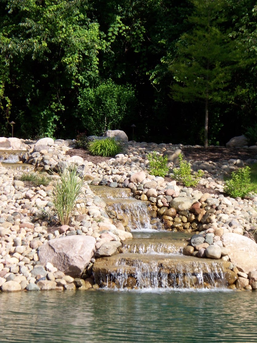 Natural rock backyard waterfall